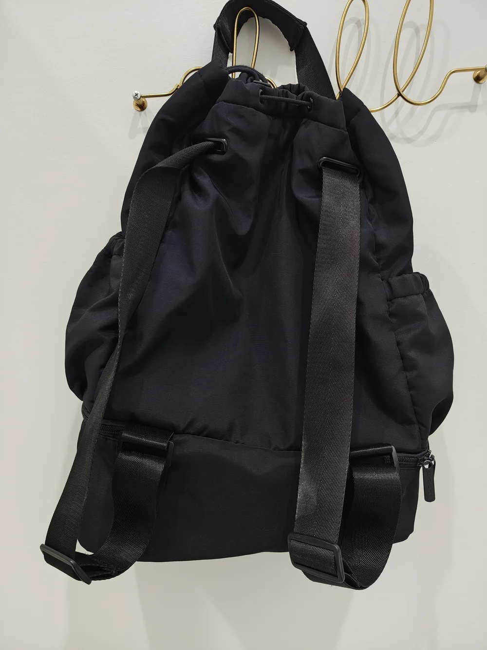 Beyond Yoga Black Convertible Drawstring Backpack with Front Zip Compartment